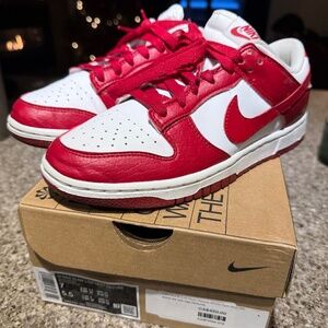 Gently used WMN Nike dunk low next nature size 7 gym red / white